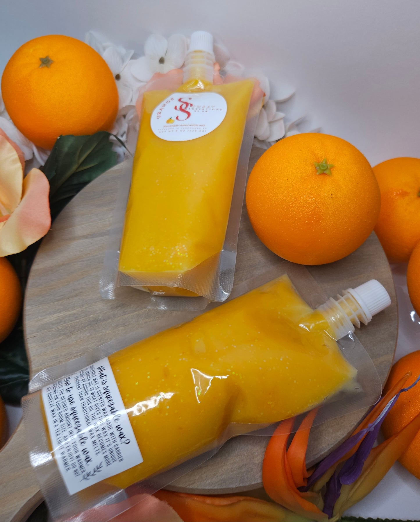 Orange squeezeable wax