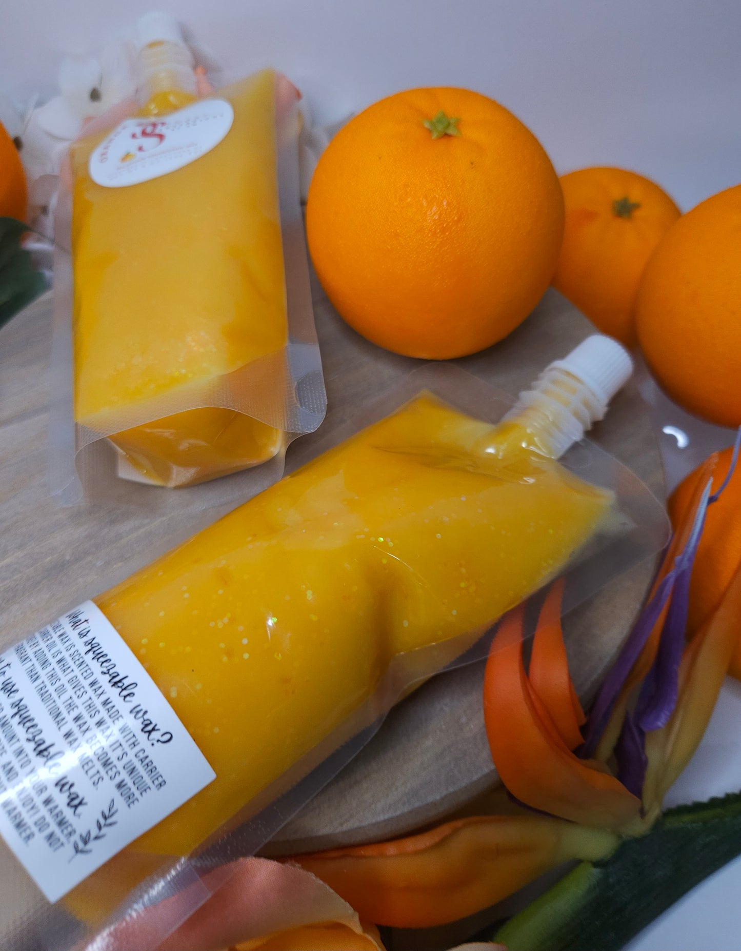 Orange squeezeable wax